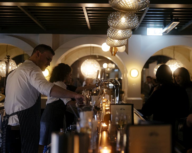 The busy bar at Saxon + Parole.