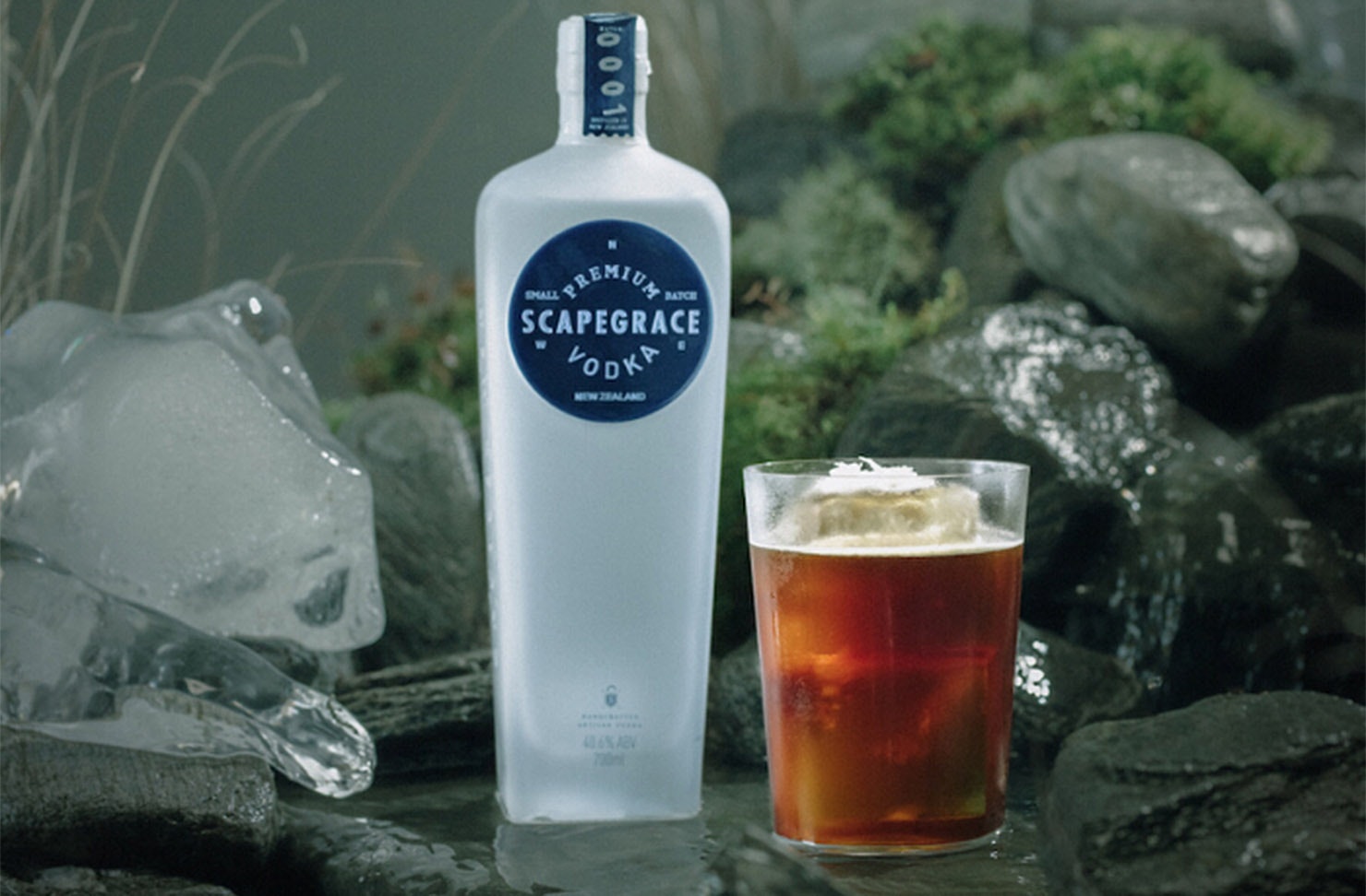 Scapegrace's Crema cocktail next to a bottle of Scapegrace vodka.