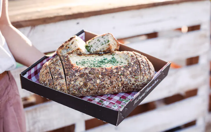 a cheese loaf at the Scarborough Beach Sunset Markets Winter Editition