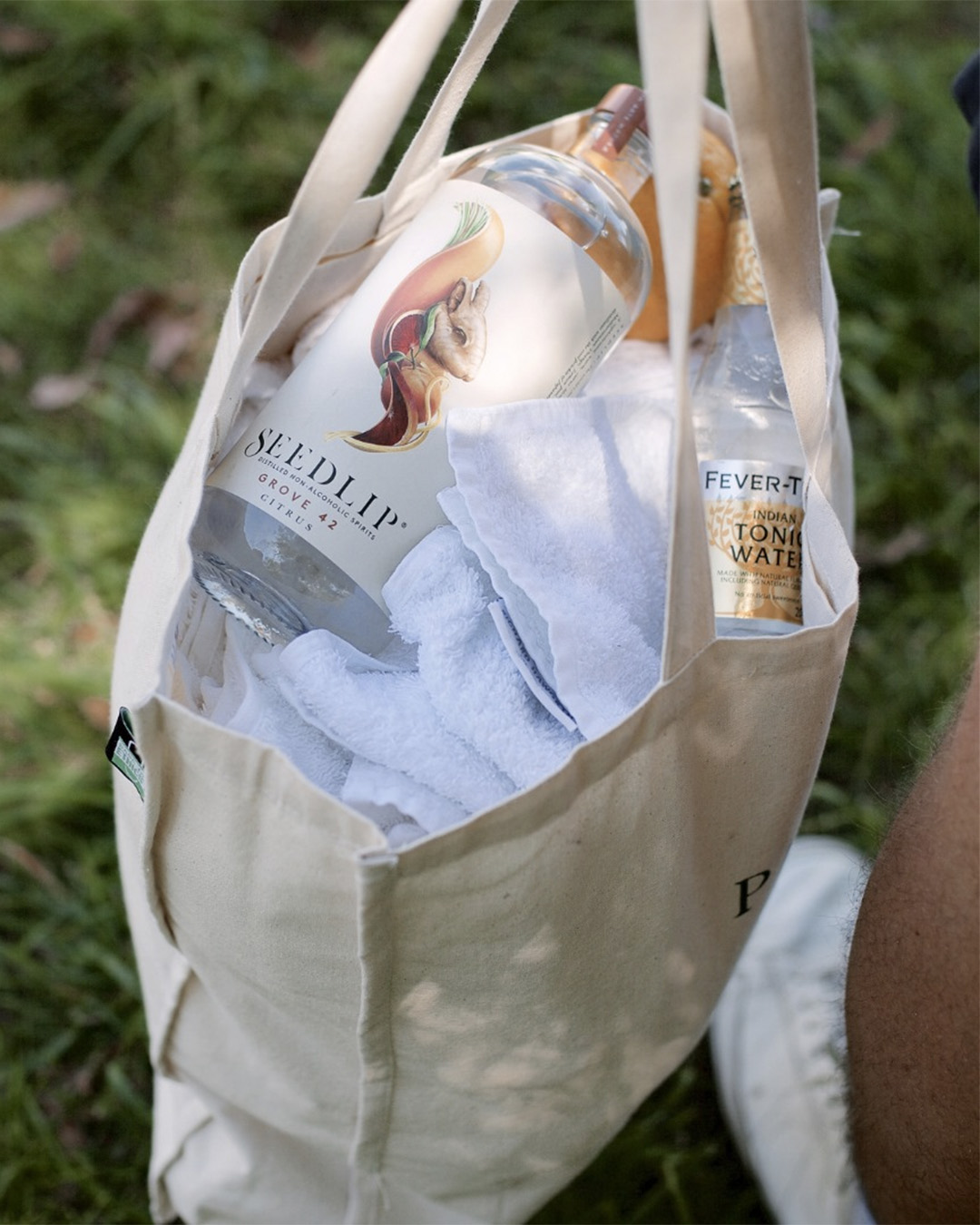Someone heads out with Seedlip and Fever Tree tonic stashed in his bag.