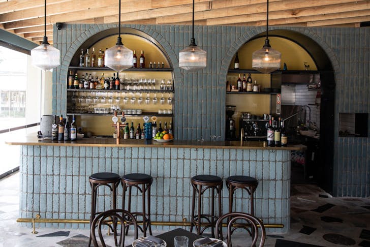 The blue-tiled bar at Sella Vinoteca in Sydney. 