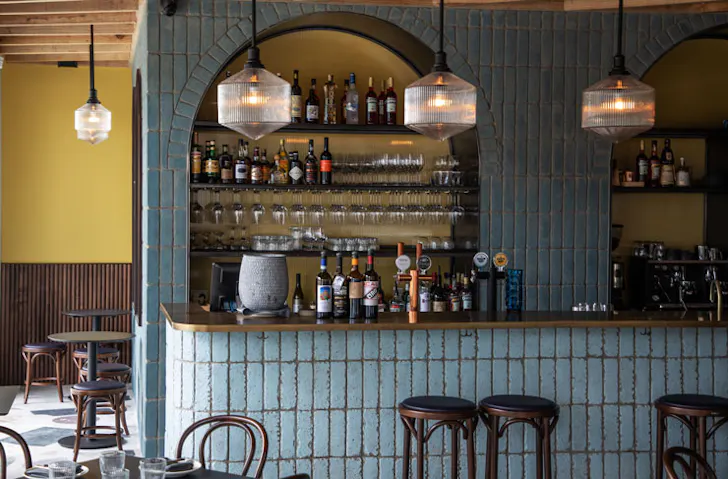 The blue-tiled bar at Sella Vinoteca in Sydney. 