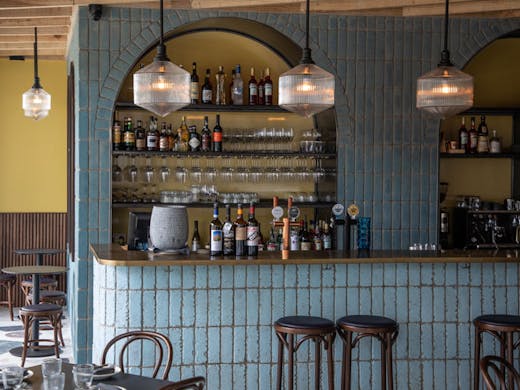 The blue tiled bar at Sella Vinoteca in Sydney. 