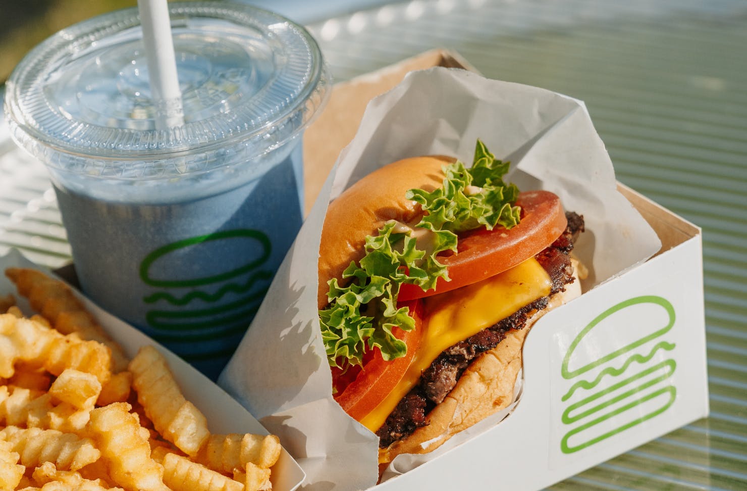 shake shack burger, crinkle cut fries and blue smash shake at australian open pop-up