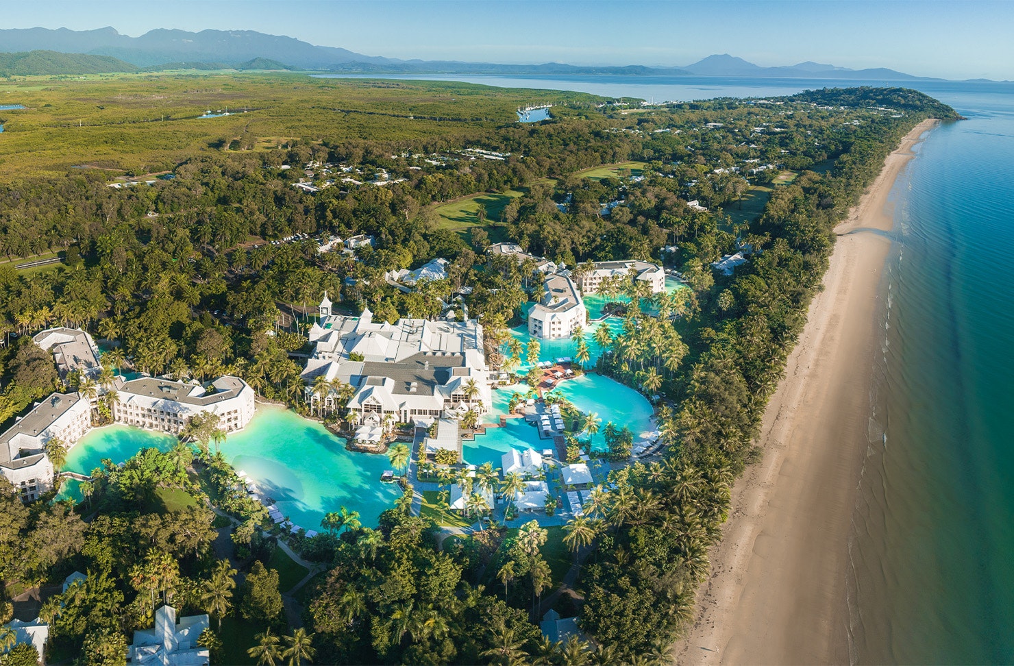 an aerial view of the lagoons at Sheraton Grand Mirage Port Douglas