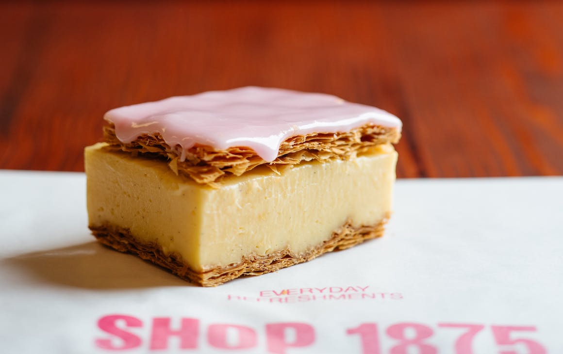 a vanilla slice from SHOP 1875 in the State Buildings