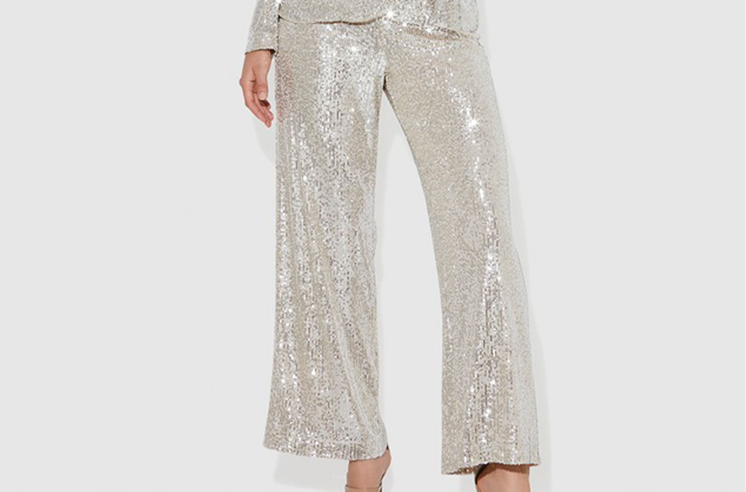 Make an epic statement in our Sequin Silver Flare Pants. These