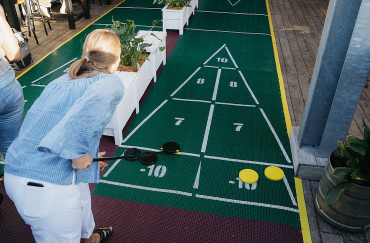 Challenge Your Mates To A Game Of Giant Shuffleboard At This Leafy