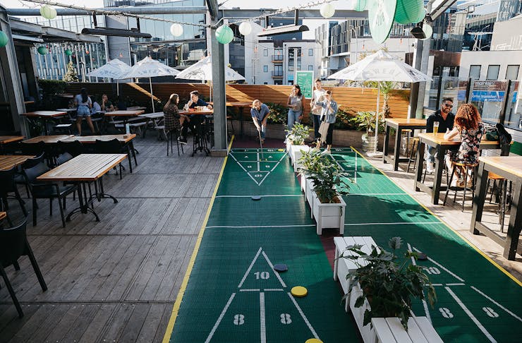 Challenge Your Mates To A Game Of Giant Shuffleboard At This Leafy