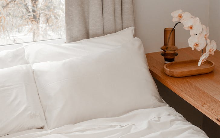 white pillows on a bed