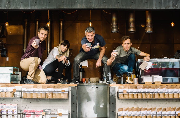 Staff from Single O pose outside the Surry Hills cafe. 