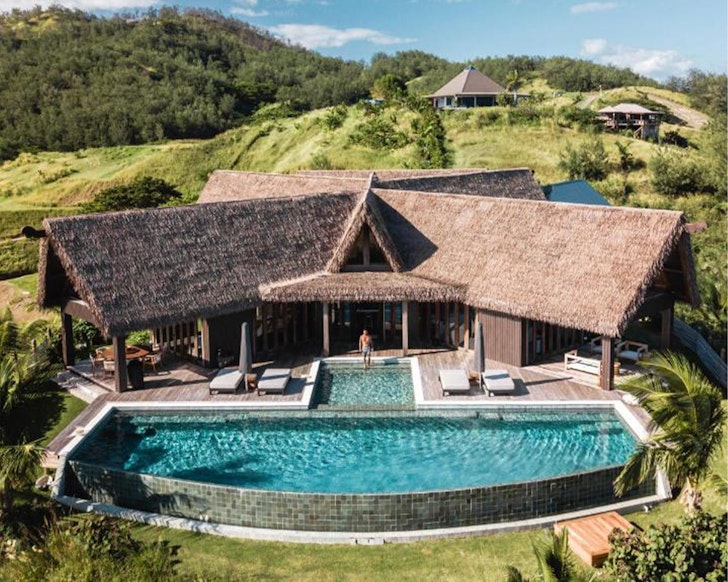 a four bedroom villa with a pool at six sense fiji resort