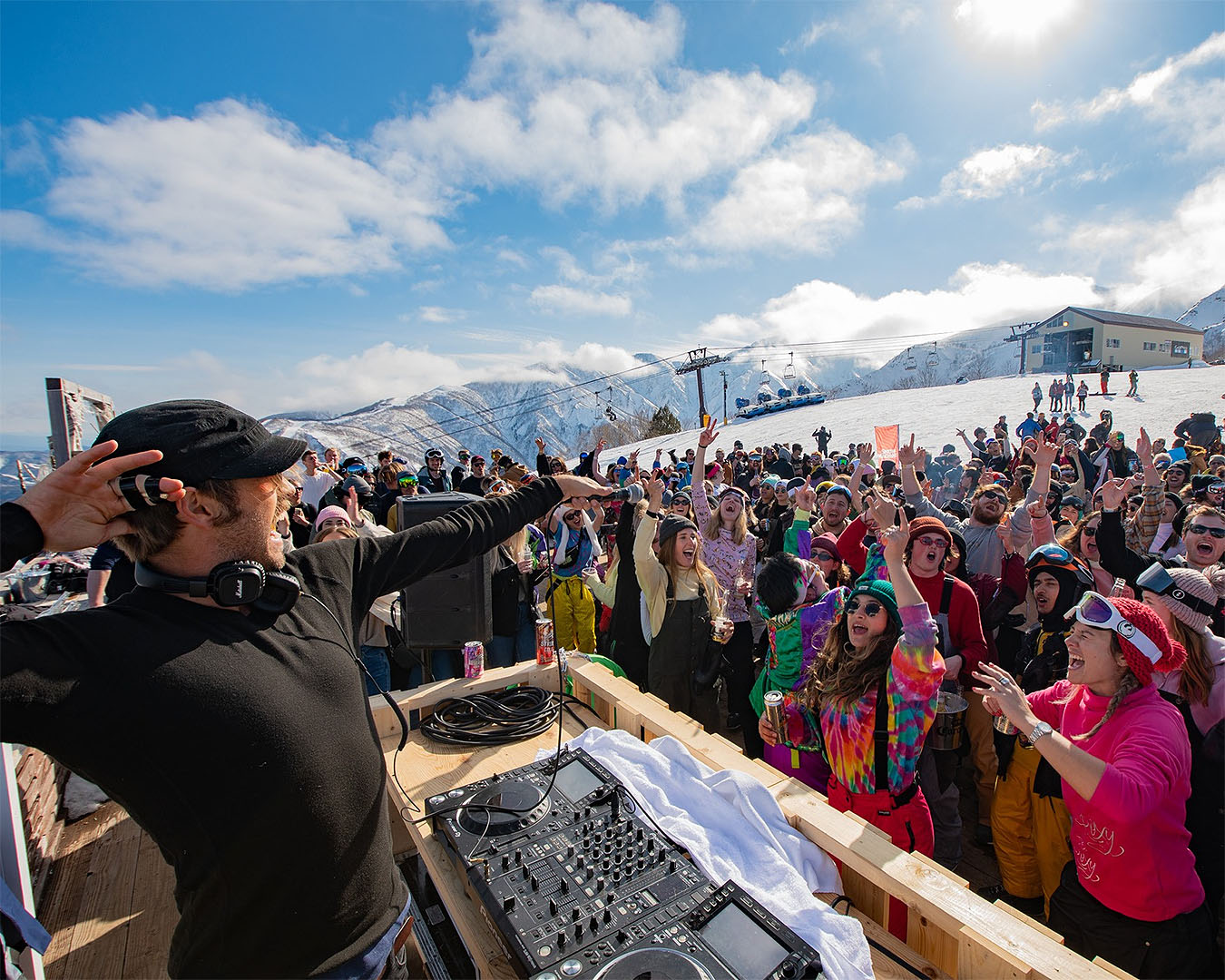 Revellers vibe up a mountain at Snow Machine, one of the best music festivals in NZ.