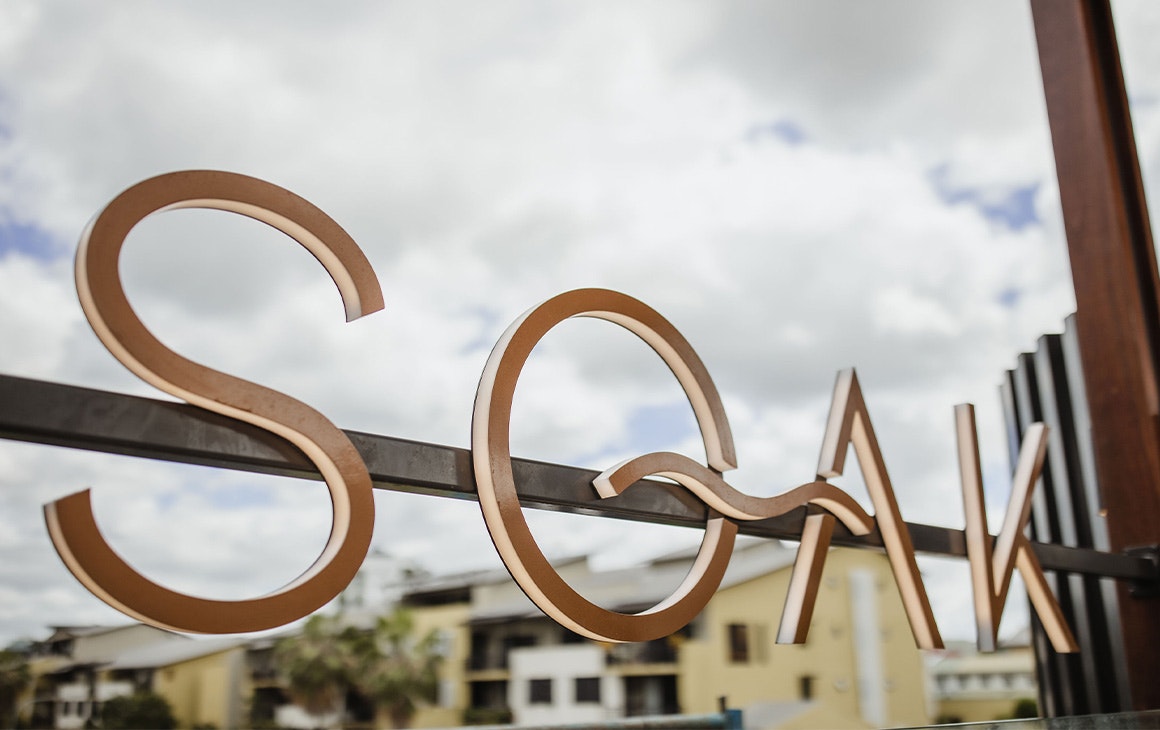 a sign saying soak
