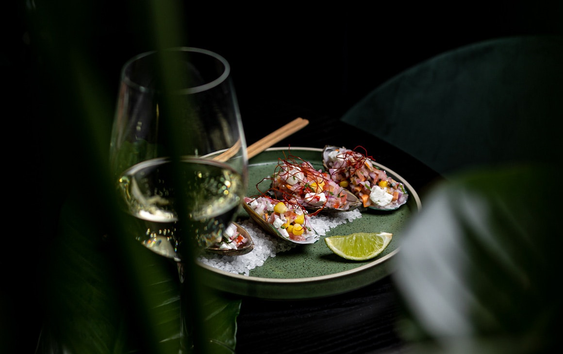 a seafood dish served in oyster shells