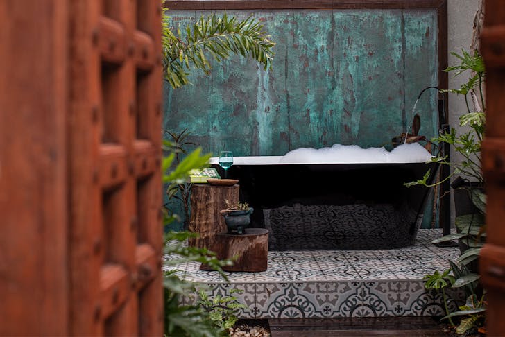 an outdoor bath in a courtyard