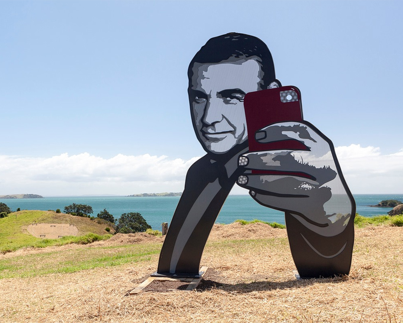Sculpture on the gulf shows Roger Moore taking a selfie.