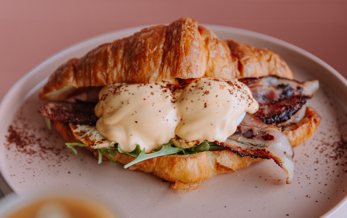eggs benny on a croissant