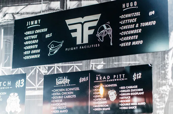 The Flight Facilities menu board at South Dowling Sandwiches