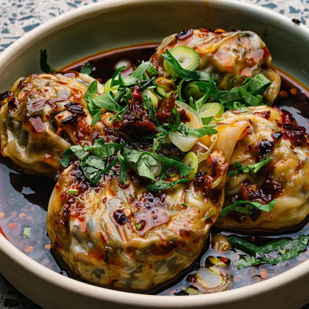 a bowl of wontons in chilli oil