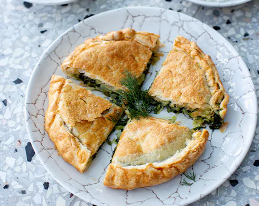 A plate of spanakopita pastry