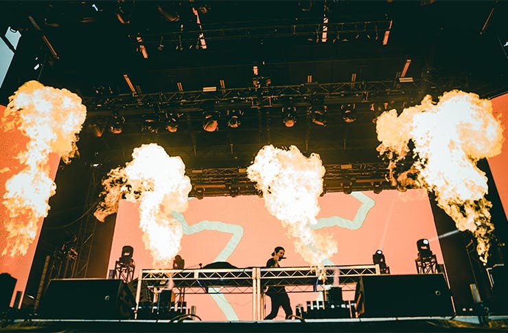 a DJ set with fire displays