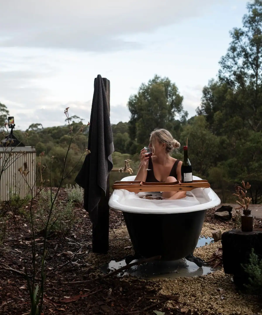 A woman in an outdoor bath