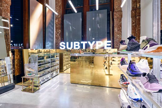 The gold front desk at Subtype Store in Sydney.