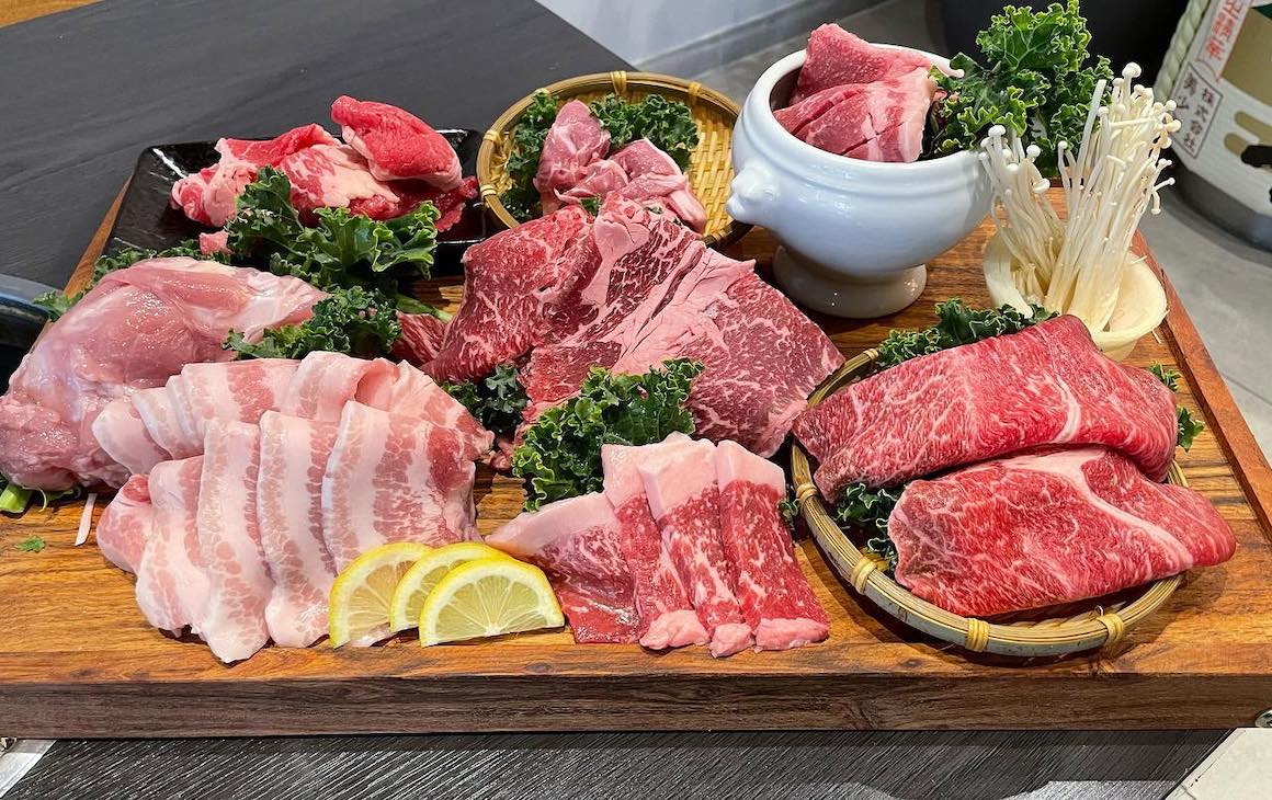 A platter filled with raw meat for Japanese BBQ