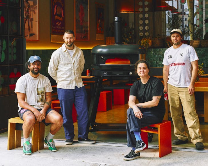 An image taken of the four chefs involved with Ace Hotel Sydney's Sunday Arvos, including the new pizza oven they will be using.