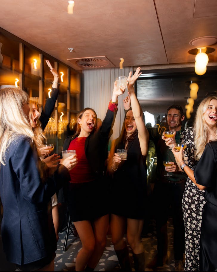 People party inside Sunset Bar.