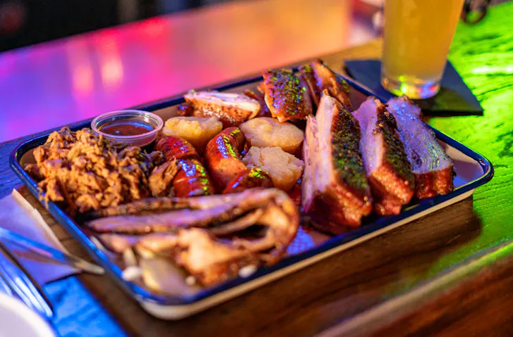 A tray of smoked meats on the bar at Surly's Tavern in Surry Hills, Sydney. 