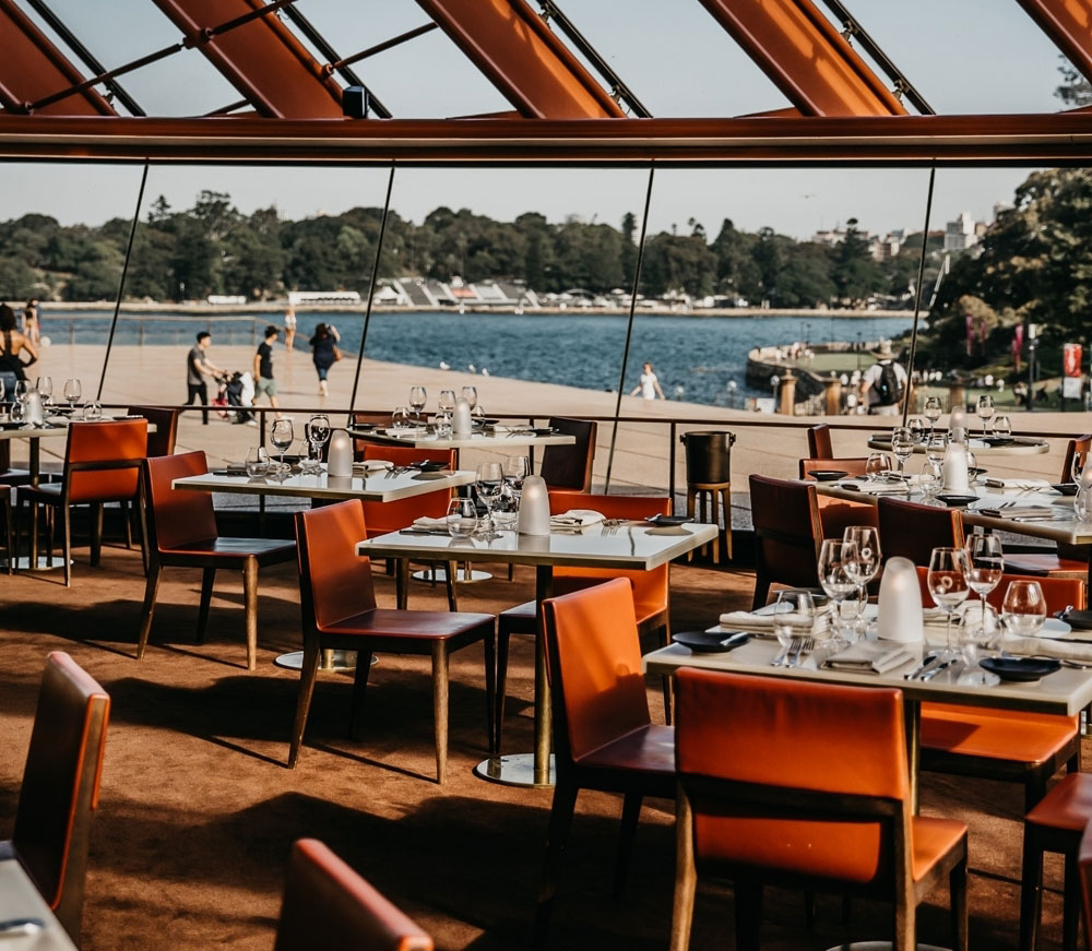 Orange hues in the dining room at Bennelong, one of the best restaurants in Sydney
