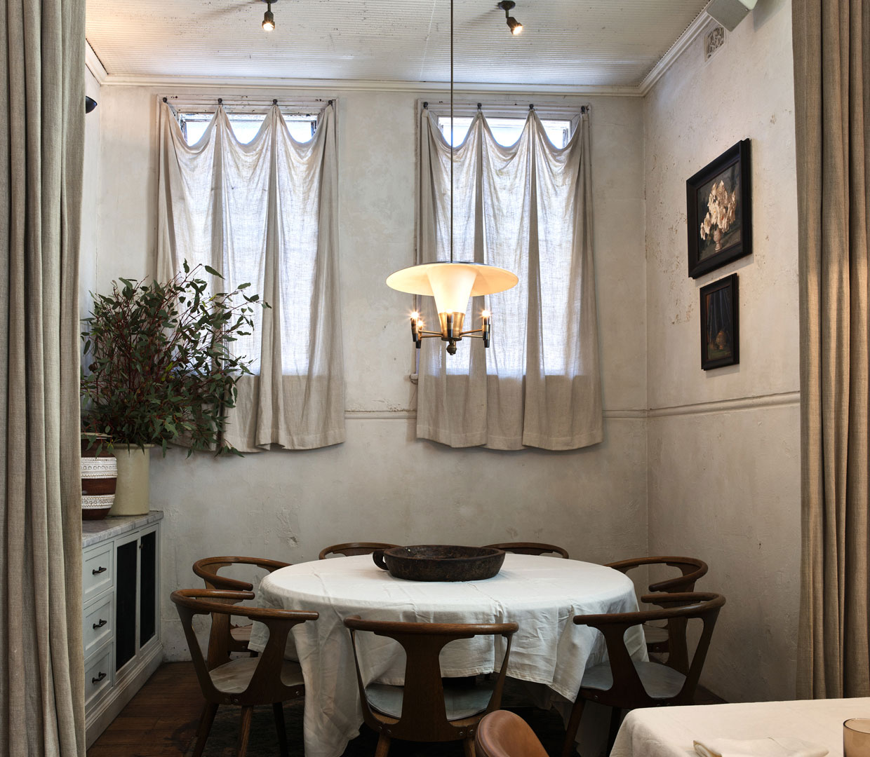 The rustic white private dining room at Fred's, one of the best restaurants in Sydney