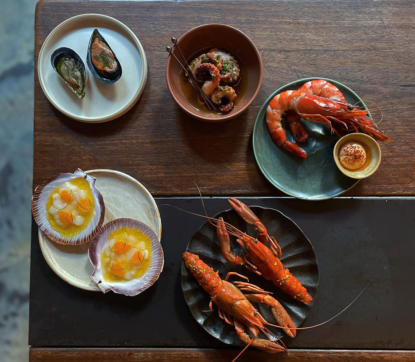 A seafood snack flight at Longshore, one of the best restaurants in Sydney