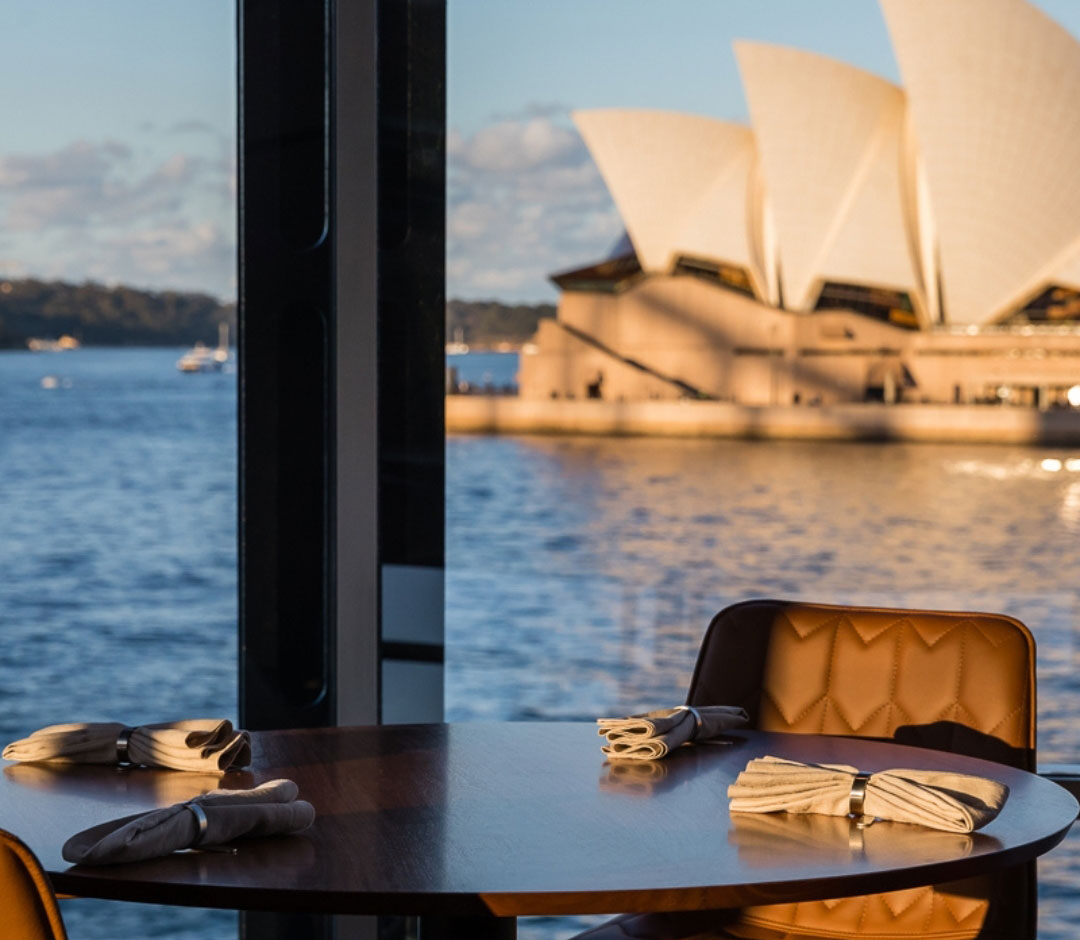 A table with a view of the Sydney Opera House at Quay, one of the best restaurants in Sydney