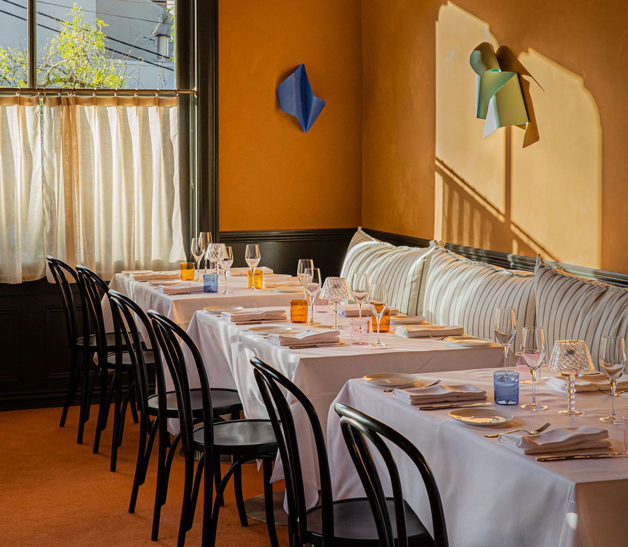 The bright caramel hued dining room at Ursula's, one of the best restaurants in Sydney