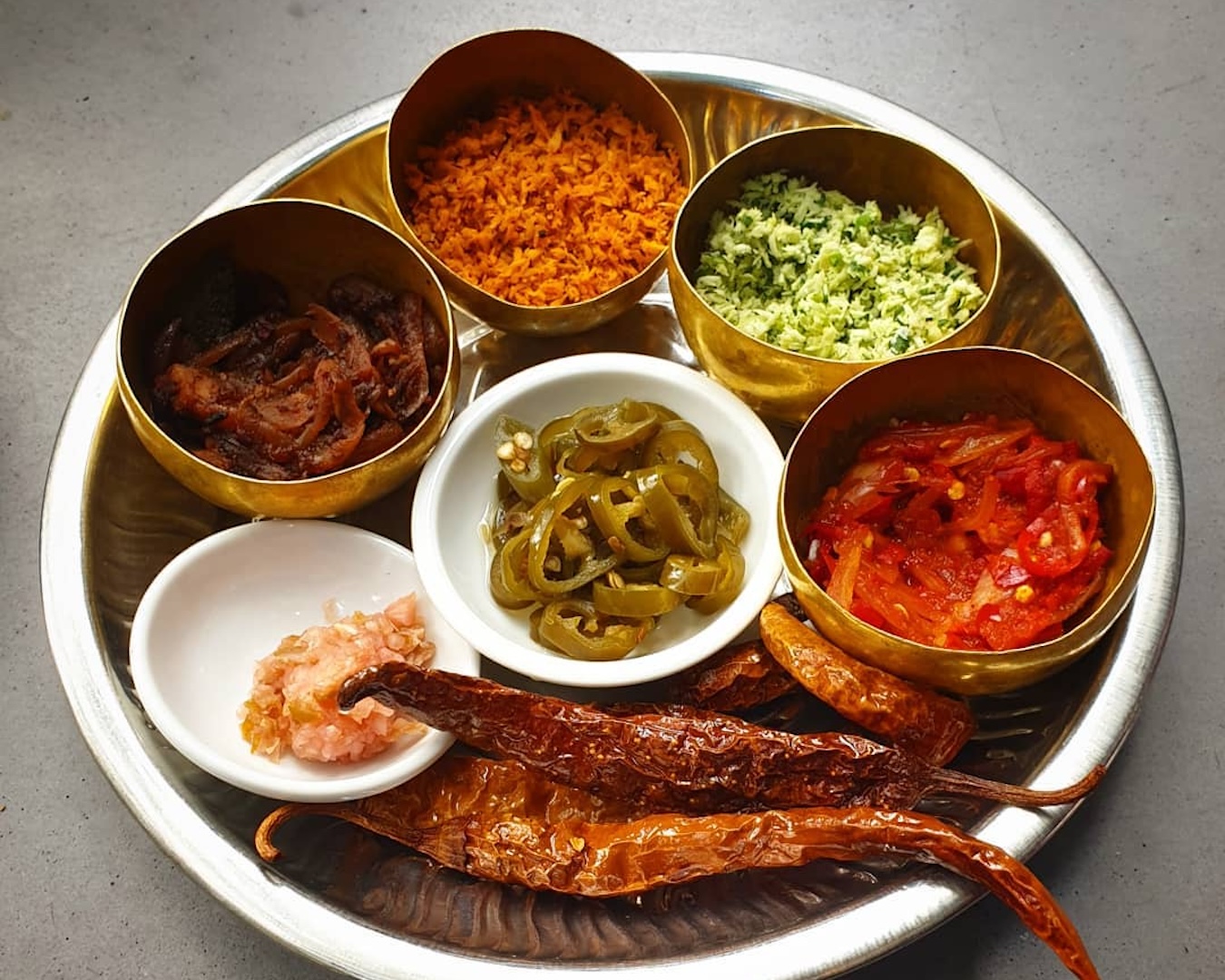A plate of spices and sambol at Sydney Sri Lankan restaurant Lankan Filling Station