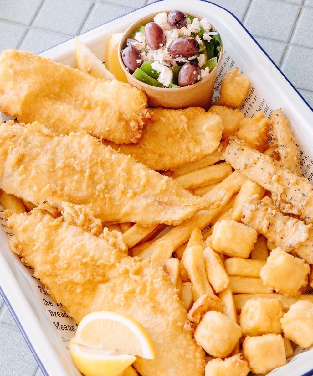 a tray full of fish and chips from Tankk