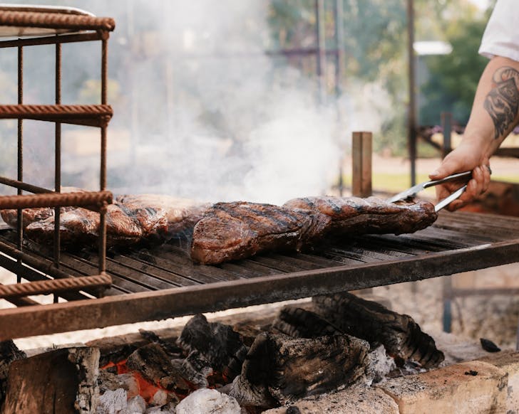 meet grilled over flames on coals for under one sky, part of tasting australia 2026