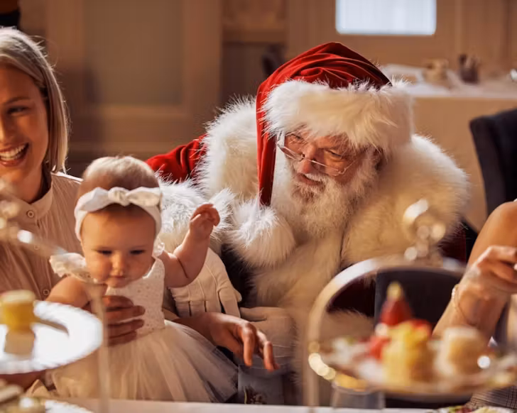 Santa at the Tea Room QVB with kids at high tea.