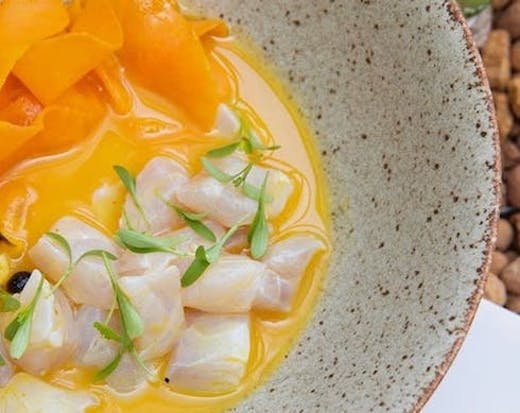 A bowl of a vegan dish that looks like sashimi