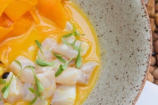 A bowl of a vegan dish that looks like sashimi