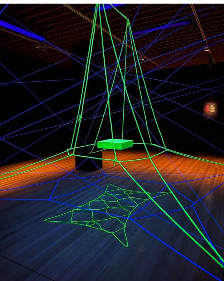 uv light installation of traditional Maori string game at te papa