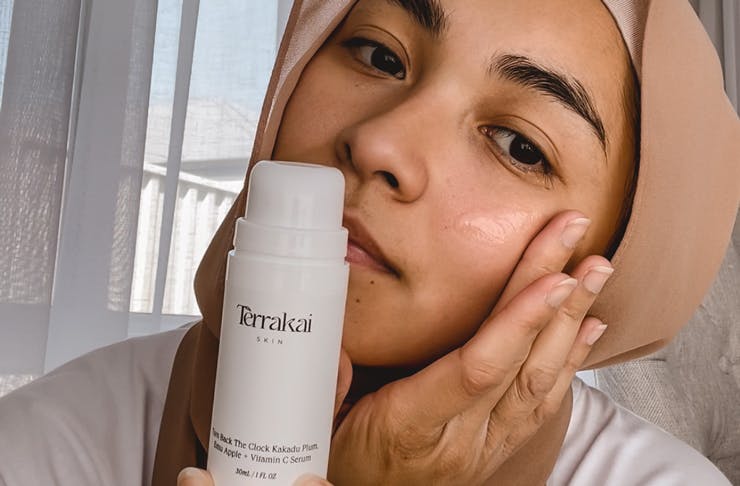 A model using a Terrakai skin serum. 