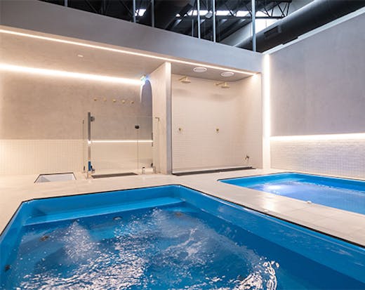 two pools in a white room