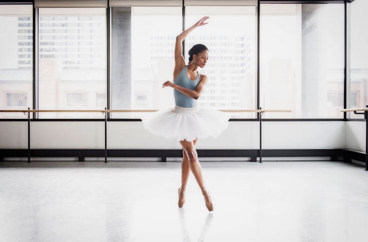 Ballerina in light-filled studio