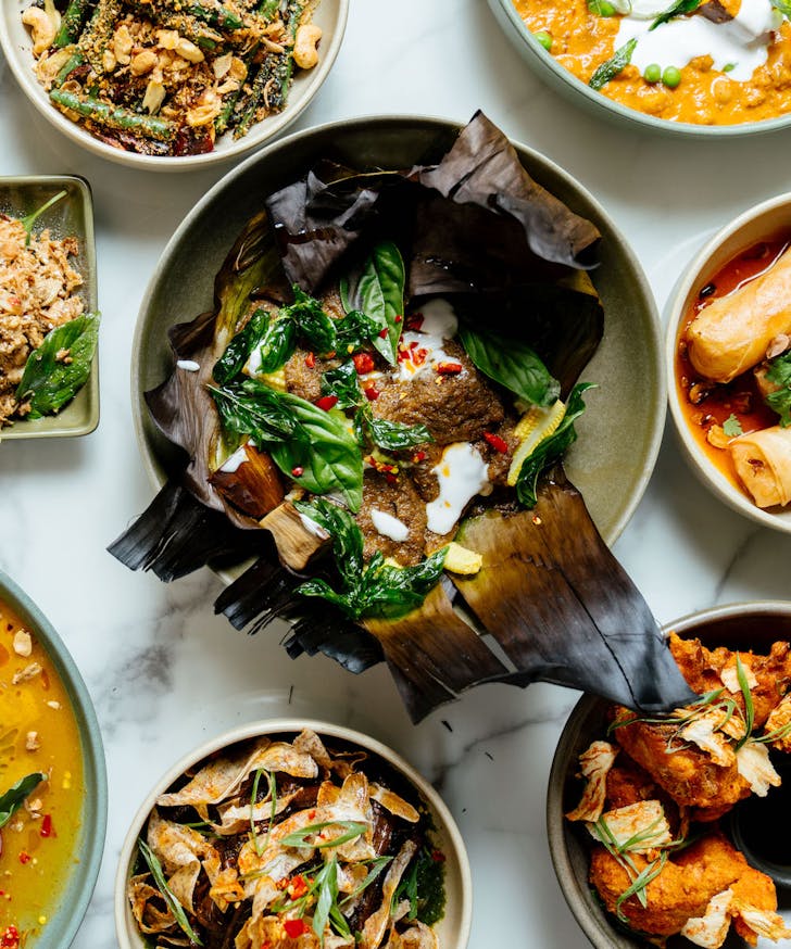 a table filled with share plates from Lotus
