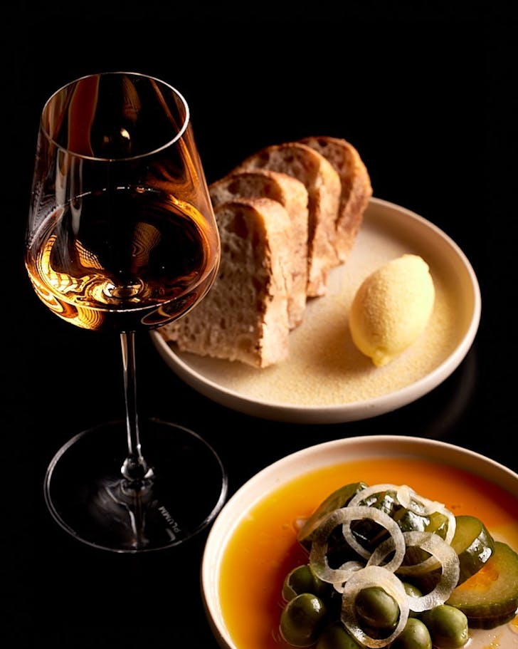 A glass of wine and snacks at The heritage bar in Perth's CBD