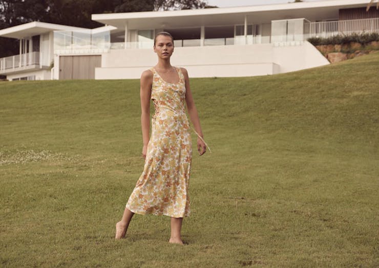 A model wearing a patterned maxi dress from LOVER